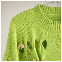 Distressed Knitted Sweater With Gold Safty-pins