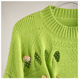 Distressed Knitted Sweater With Gold Safty-pins