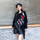 Asymmetrical Multi Pattern Knitted Sweater